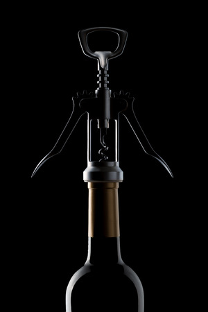 Corkscrew and wine bottle on a black backgroundの写真素材