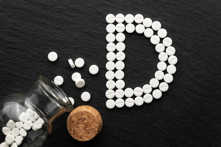 Vitamin D lettering lined with pillsの写真素材