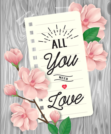 All you need is love lettering on notebook paper with sakura blossoms on grey wooden background. Inscription can be used for greeting cards, festive design, posters, banners.のイラスト素材