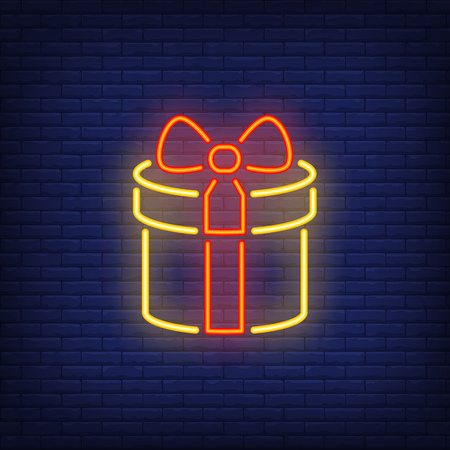 Gift box with bow neon sign. Holiday advertisement design. Night bright neon sign, colorful billboard, light banner. Vector illustration in neon style.のイラスト素材