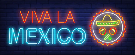 Viva la Mexico neon text with maracas and sombrero in circle. Mexican culture design. Night bright neon sign, colorful billboard, light banner. Vector illustration in neon style.のイラスト素材