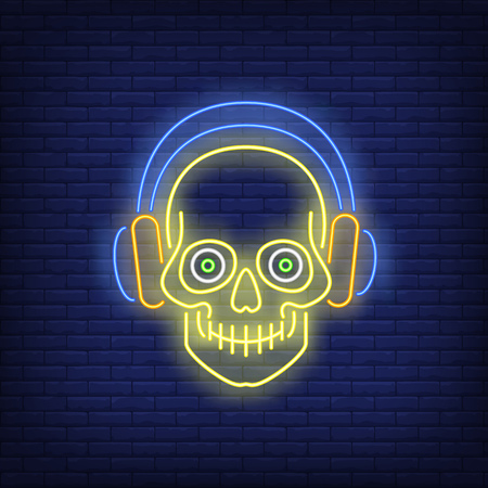 Skull wearing headphones neon sign. Music, tattoo or logo design. Night bright neon sign, colorful billboard, light banner. Vector illustration in neon style.のイラスト素材