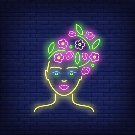 Spring girl neon sign. Woman head covered with pink blossoms and green twigs on brick wall background. Vector illustration in neon style for billboards, seasonal banners, flyersのイラスト素材