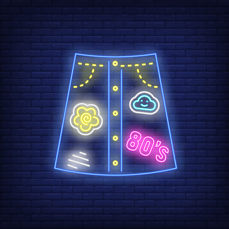 Bright denim skirt neon sign. Glowing denim skirt with embroided patches on brick wall background. Vector illustration can be used for topics like fashion, clothing, wardrobeのイラスト素材
