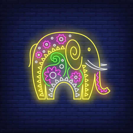 Decorated Indian elephant neon sign. Culture, religion, animal design. Night bright neon sign, colorful billboard, light banner. Vector illustration in neon style.のイラスト素材