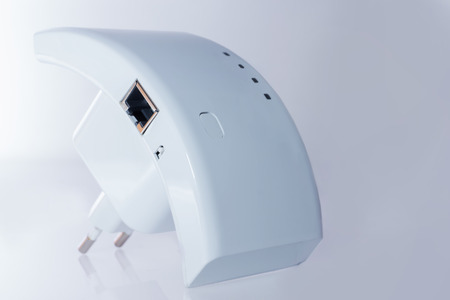 wifi repeater for communication with the Internet on  white backgroundの写真素材
