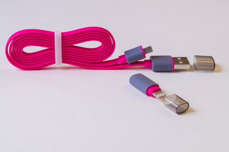 pink USB cable on light backgroundの写真素材