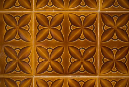 vintage  brown Portugese tiles on a wallの写真素材