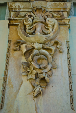 floral sculpture ornament detail on a wallの写真素材