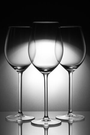 three glasses on glass plateの写真素材