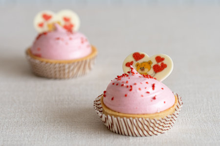 Delicious caramel Valentines Day Cupcakes With Heart Shape and raspberry tasteの写真素材