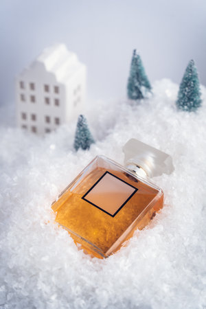 Bottle of perfume, frosted, stands in the snowの写真素材