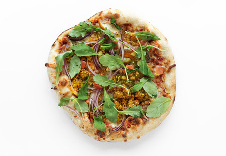 Falafel pizza with falafel,pickles,tomato,paprika,onion,dried basil, isolated on white background. Pizza top view.の写真素材