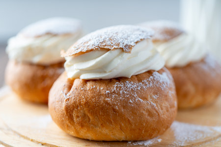 Semla or vastlakukkel is a traditional sweet roll with whipped cream made in Scandinavic, Baltic...