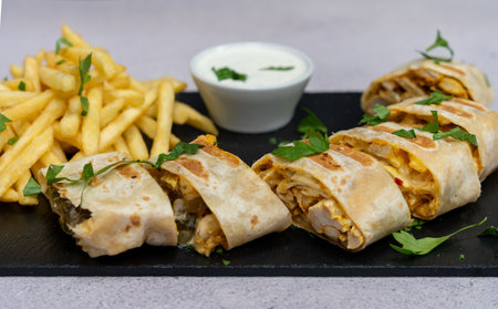 Wrap kebab with fries and sous. Close up. Top view.の写真素材