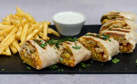 Wrap kebab with fries and sous. Close up. Top view.の写真素材