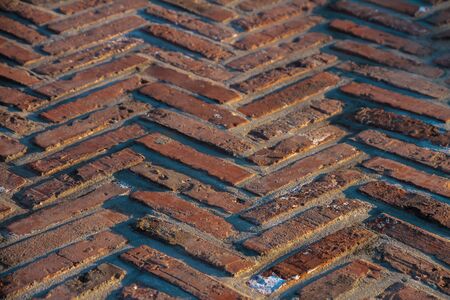 Red brick placed together to form a beautiful triangular path,Background.