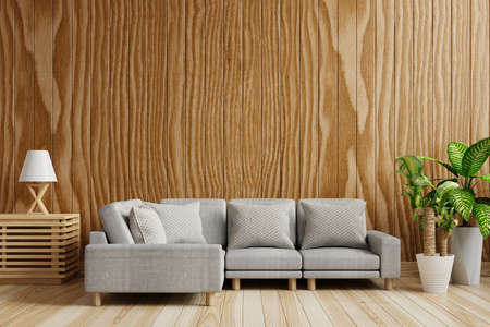 Living room with beautiful patterned dark wood walls, empty, decorated with sofas. And there were trees and lanterns on the side.3d renderingの写真素材