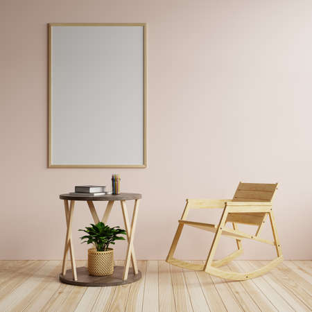 Living room with a large frame on the walls in beautiful pink. Decorated with a tree table and rocking chair on the wooden floor.3d renderingの写真素材