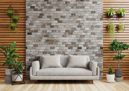 Living room with a brick wall Decorated with a sofa, plant pots on the floor. And a tree hanging on...