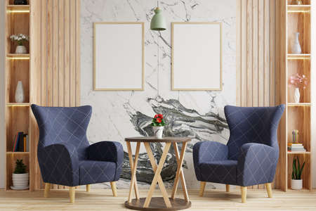 Living room with blue armchairs sits on the wooden floor, decorated with vases on the shelves, and has a picture frame on the marble wall behind it.3d renderingの写真素材