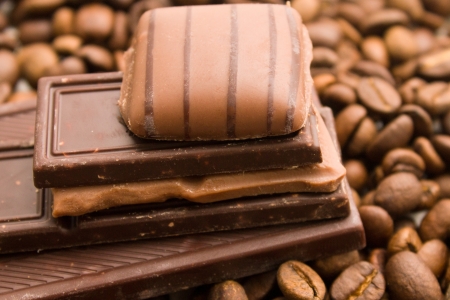 chocolate on coffee beans background