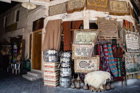 Doha, Qatar - March 2, 2020: View on traditional arabian market Souq Waqif selling carpets and clothes in Doha City in Qatarのeditorial素材
