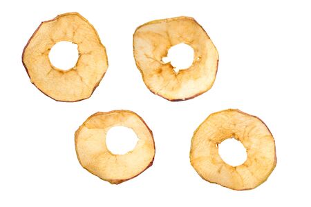 Dried apple slices isolated on white with clipping pathの写真素材