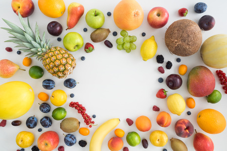 Overhead shot of a collection of different summer fruits with copyspace