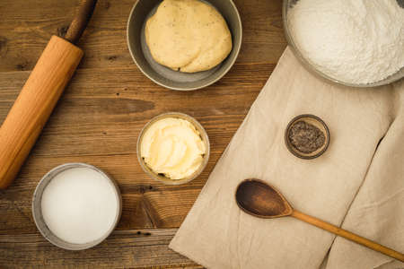Flatlay collection of tools and ingredients for baking vegan  cookies with margarine and chia seeds...