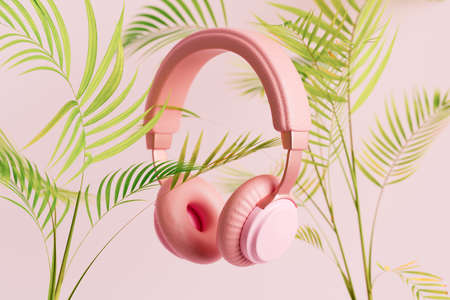 Pink headphones with tropical plants on pink background, 3D renderingの写真素材