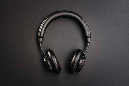 Black headphones on black background, 3D renderingの写真素材