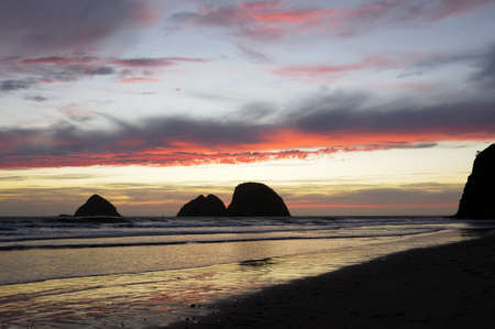 Sunset Clouds over Three Arch Rocks at Oceanside on the Oregon coast.の写真素材