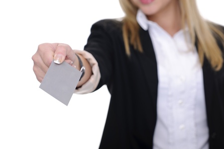 woman on white background holding stickynotes or empty cardboardの写真素材