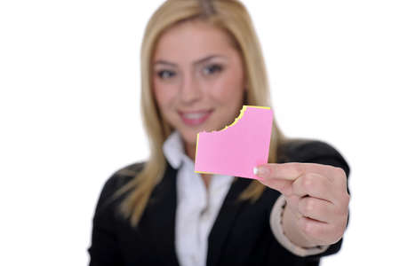 woman on white background holding stickynotes or empty cardboardの写真素材