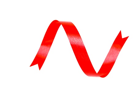 red and curly ribbon on white backgroundの写真素材