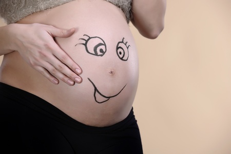 beautiful and curly pregnant woman studio shoot