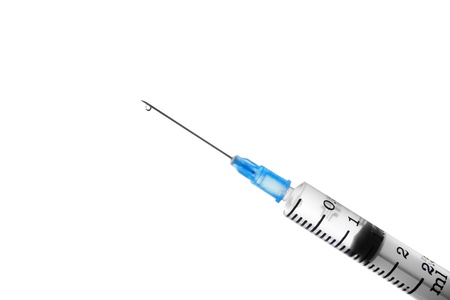 syringe with drop isolated on white backgroundの写真素材