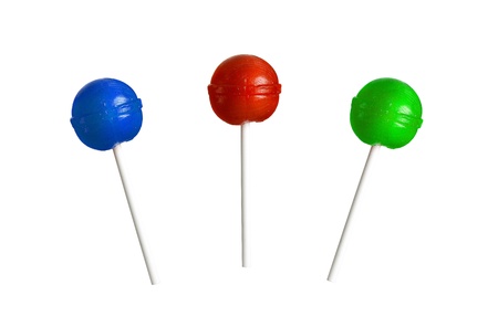 Red, blue and green lollipop isolated on white background.の写真素材