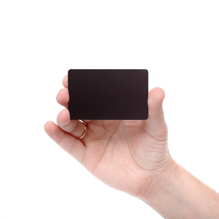 Hand with a black card isolated on white background