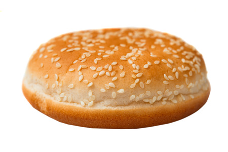 bun with sesame seeds for a hamburger isolated on white backgroundの写真素材