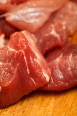 Pieces of fresh raw meat close-upの写真素材
