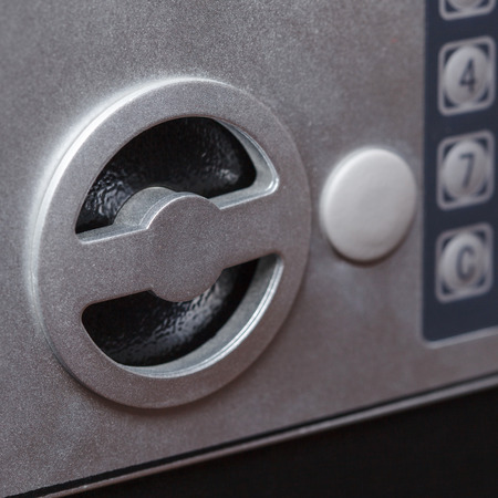 Electronic home safe keypad, Small home or hotel wall safe with keypad, closeupの写真素材