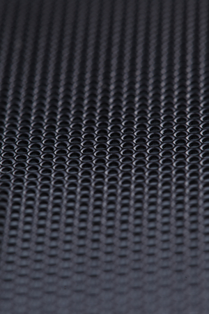Black metal texture pattern with holes round