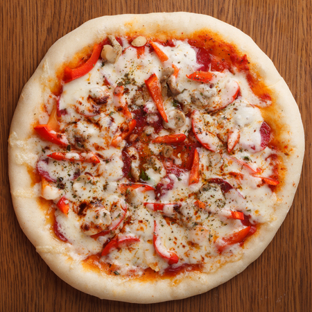 the Italian pizza with cheese and salamiの写真素材