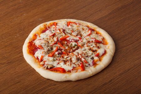 the Italian pizza with cheese and salamiの写真素材