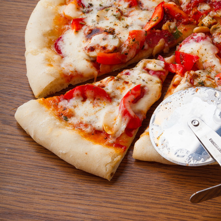 the Italian pizza with cheese and salamiの写真素材