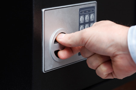a man hand opened a safe, close up