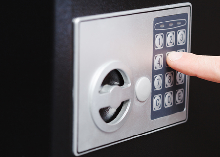 a man hand opened a safe, close upの写真素材