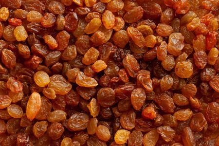 Brown raisins close-up.の写真素材